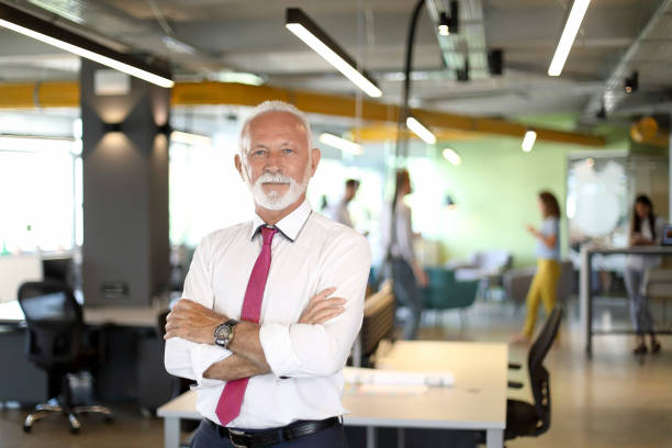 istock Mature Businessman Portrait. 1180366664
