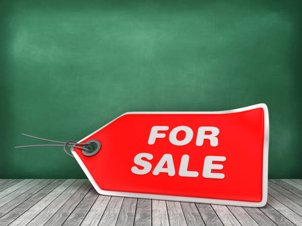 istock FOR SALE Price Tag on Chalkboard Background - 3D Rendering 1180373092