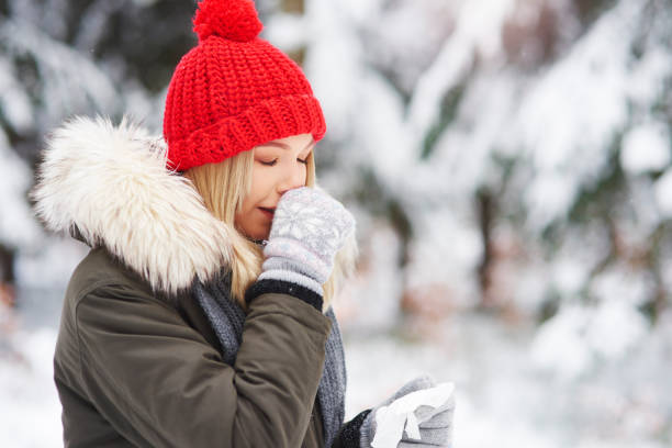 istock Young woman suffering from cough 1180374079