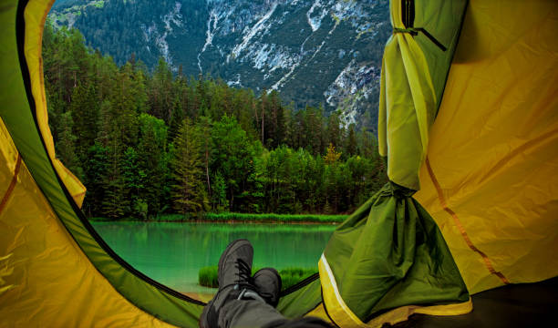 istock Beautiful Austrian countryside landscape view seen from inside a tent 1180375937