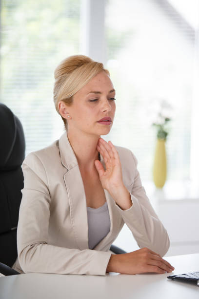 istock Businesswoman in pain at work 1180378615