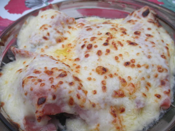 istock Endive and ham gratin with bechamel sauce  French cooking 1180380509