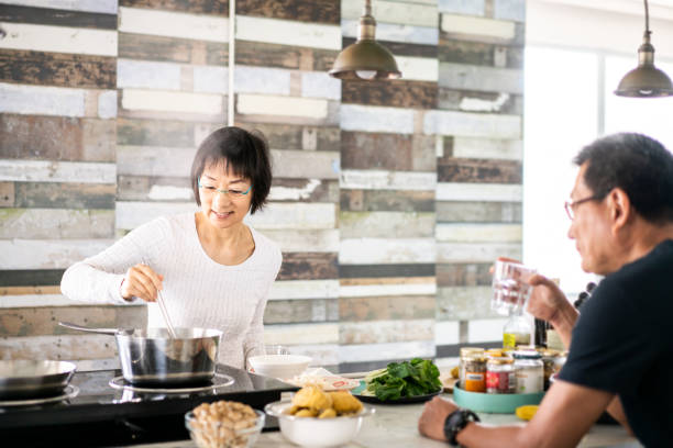 istock Chinese couple in the kitchen 1180381471