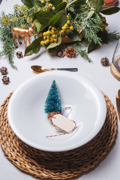 istock Elegant Christmas place settings, Pine tree figurine on the dish from above 1180382876