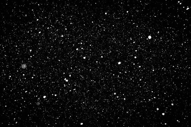 istock Snow isolated on the black background 1180384722