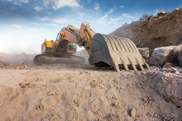 istock Large excavator in an excavation in summer 1180385050