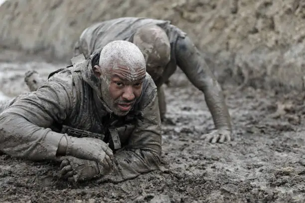 Photo of Military Mud Run Crawling Exercise