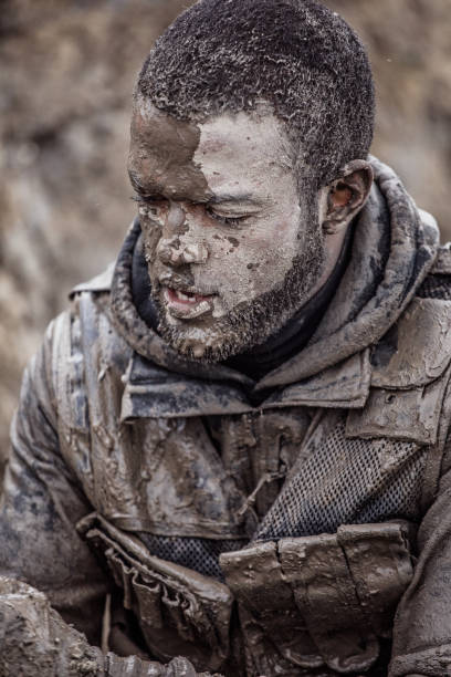 istock Military Mud Run Portrait 1180386361