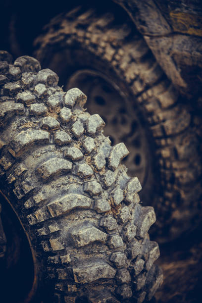 istock Muddy off road tire on a 4x4 car 1180389268