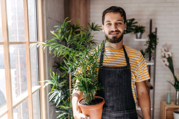istock Proud of his plants 1180391236
