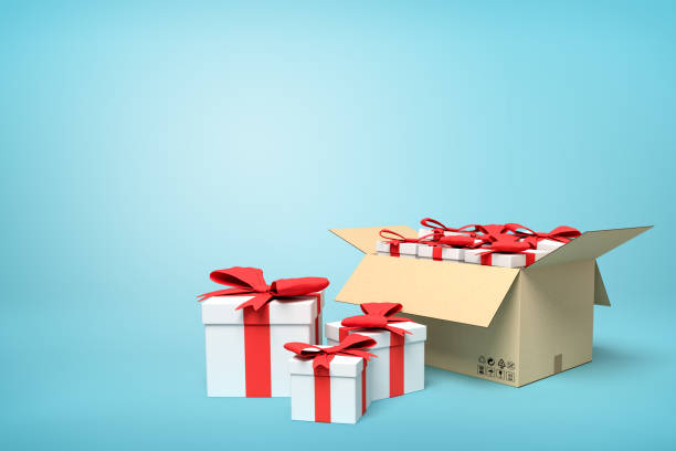 istock 3d rendering of gift boxes in carton box on blue background. 1180392648