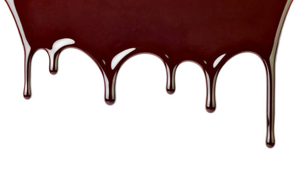 istock chocolate syrup dessert food sweet leaking drop 1180392927