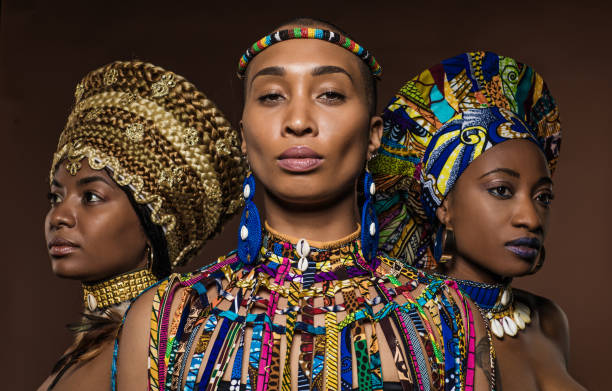 istock Three Beautiful Black Women wearing african headdresses 1180393840