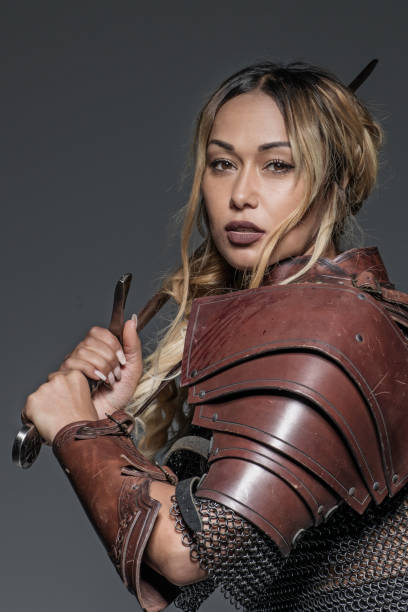 istock Beautiful black Sword wielding viking warrior female 1180394291