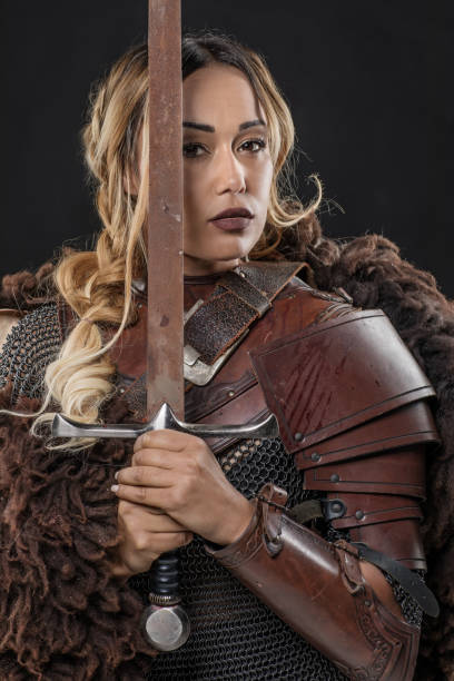 istock Beautiful black Sword wielding viking warrior female 1180394373