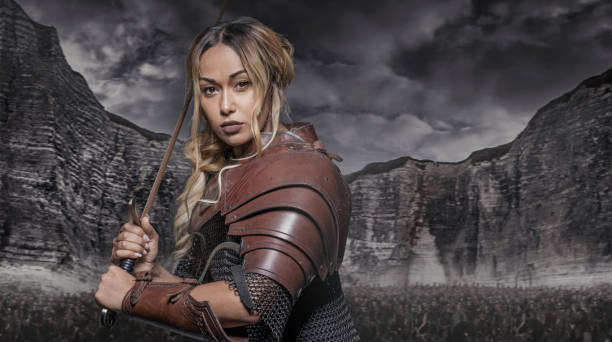 istock Beautiful black Sword wielding viking warrior female 1180394433