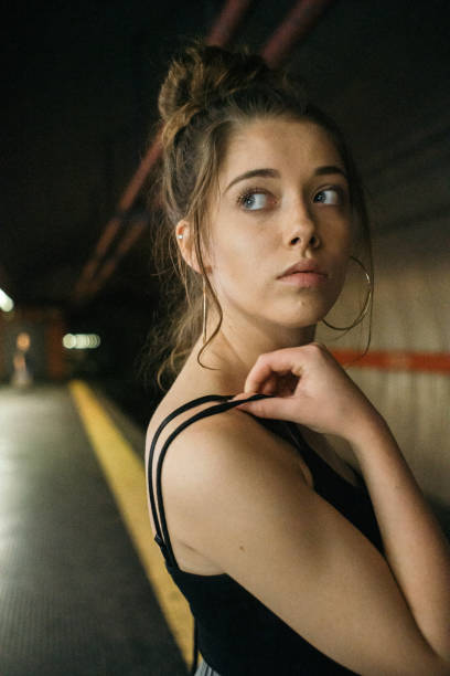 istock Girl at subway station 1180394506
