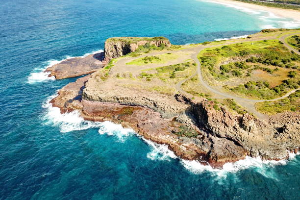 istock Rugged coastline of Bombo Headland in Australia 1180397107