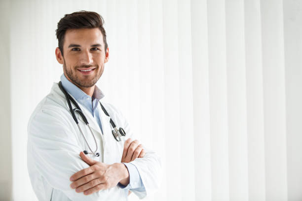 istock Portrait of confident young doctor 1180399330