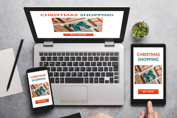 istock Christmas shopping concept on laptop, tablet and smartphone screen 1180403179