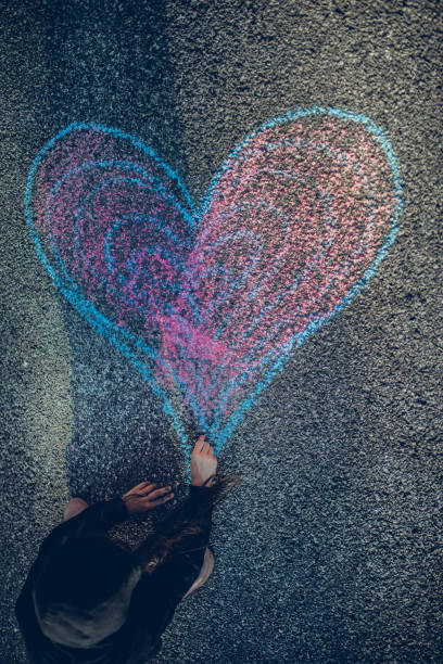 Chalk painting of an abstract lines on the pavement.