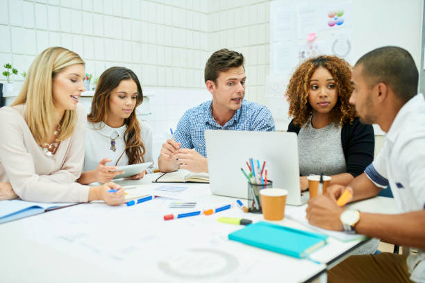 istock Combining minds to achieve combined success 1180407290