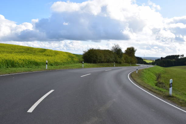 istock autumn road in rural Eifel 1180410845