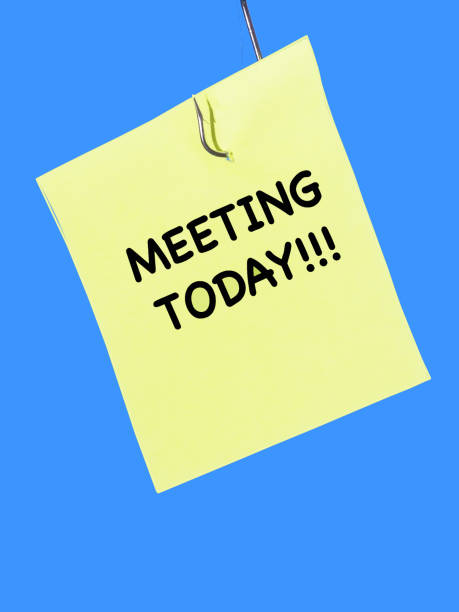 istock Post it with the words meeting today as a reminder for urgency and importance. 1180411954