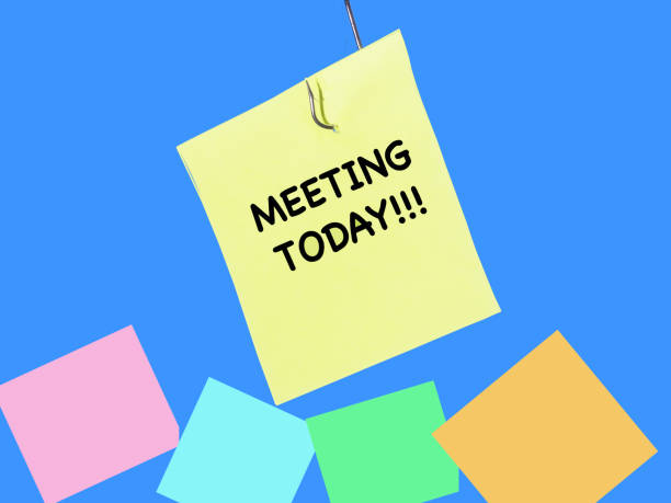 istock Post it with the words meeting today as a reminder for urgency and importance. 1180411955