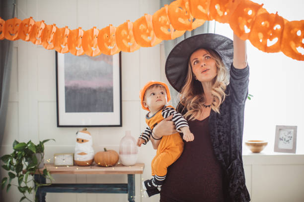 Decorating home for Halloween with baby