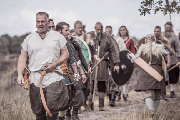 istock Viking warriors outdoors leading a scouting mission 1180413243