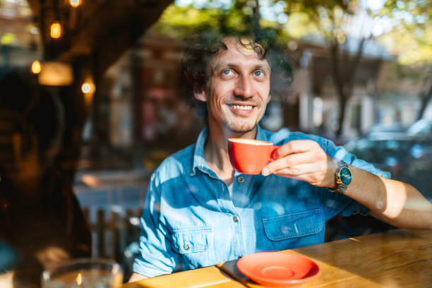 istock Man enjoying in coffee 1180414469