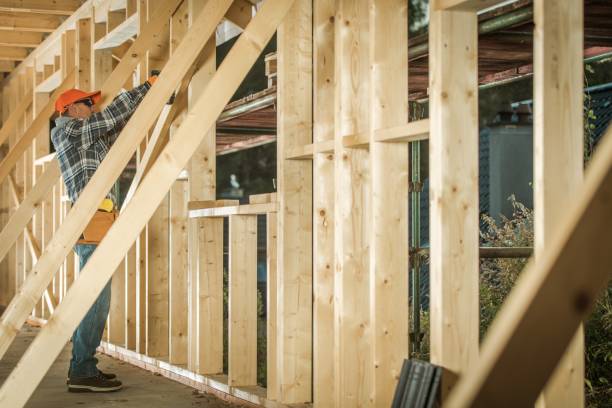 istock Wood House Construction Job 1180418384
