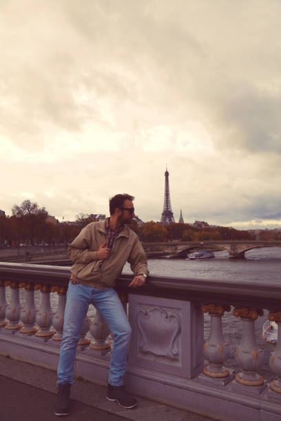 istock Handsome man enjoying in Paris. 1180419433