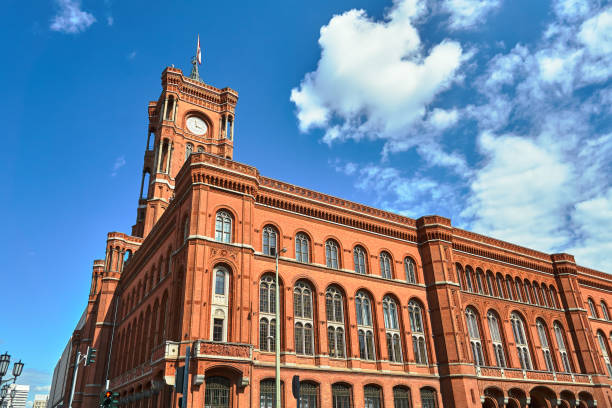 istock Neo-Renaissance Red Town Hall with the clock tower 1180422372