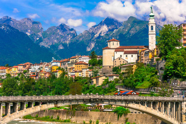 Beautiful places of northen Italy - picturesque Belluno town in Dolomites Alps mountains stock photo