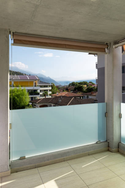 istock Balcony with travertine flooring, lilac facade 1180433941