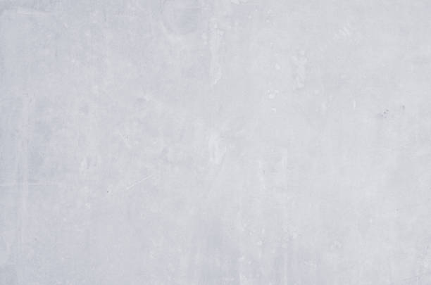istock gray concrete background texture clean stucco fine grain cement wall clear and smooth white polished grunge interior indoor. 1180433998