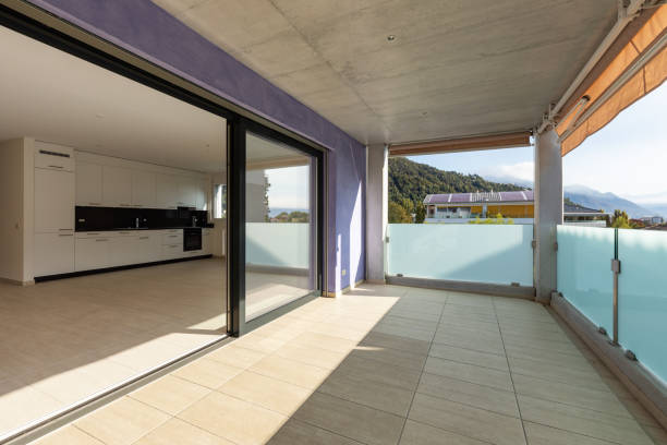 istock Balcony with travertine flooring, lilac facade 1180434008