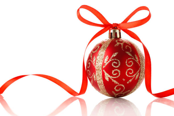 istock Red christmas ball with bow over white background 1180441448