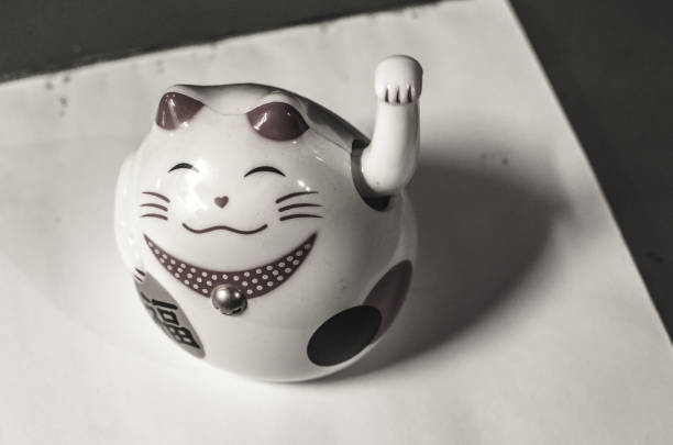 istock Maneki cat souvenir in black and white tone 1180442284