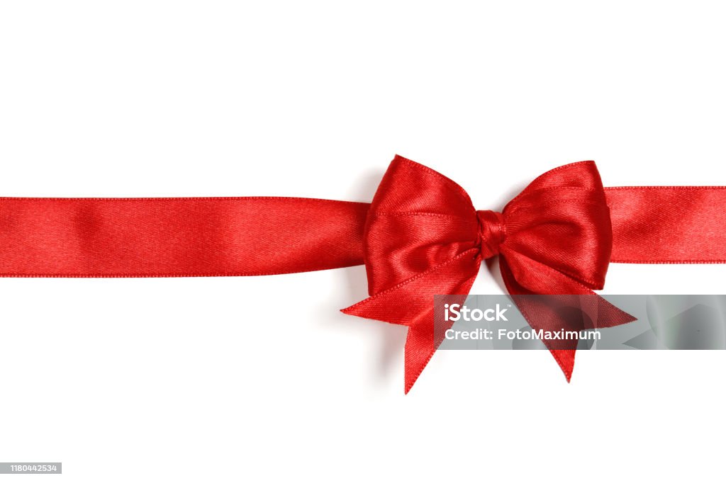 Shiny red satin ribbon on white background Shiny red satin bow and ribbon on white background Christmas Stock Photo