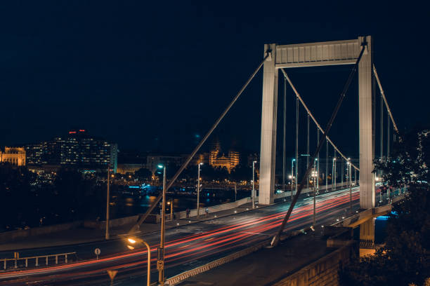 Night time traffic over the Elisabeth bridge. It crosses Danube river and connect Buda and Pest together. Budapest, Hungary.