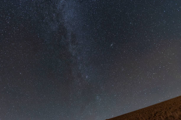 istock Starry night sky with beautiful milky way galaxy. Astronomical background. 1180445855