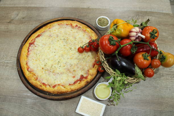 istock style food with wood-fired pizzas placed on the table with vegetable decoration 1180451800