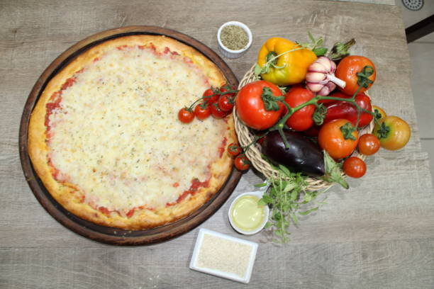 istock style food with wood-fired pizzas placed on the table with vegetable decoration 1180452597