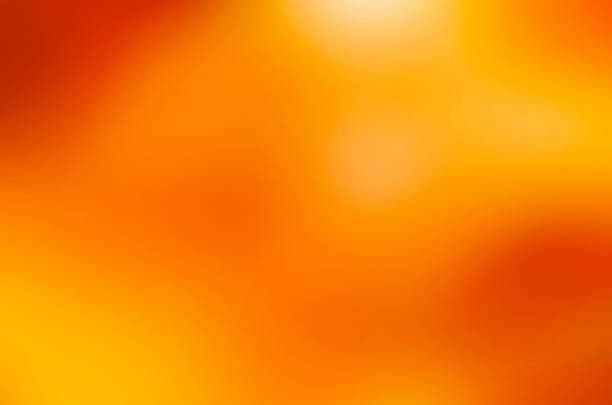 desenfocar el fondo de textura naranja - gradient fotografías e imágenes de stock