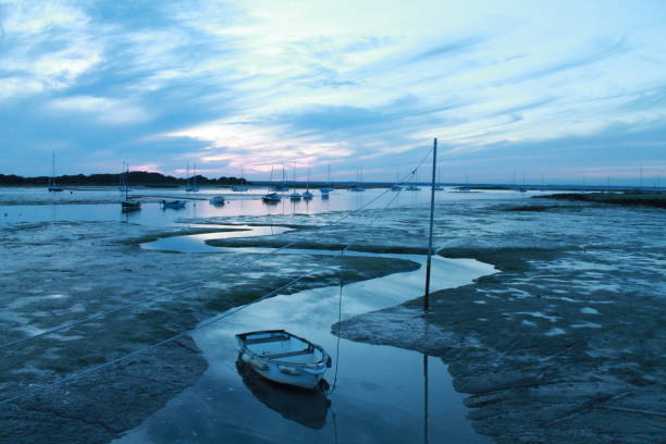 Boat moored at Wootton Creek during low tide