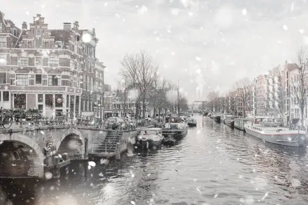 Photo of Amsterdam dull view in winter snowfall