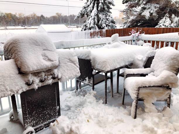 istock Patio Furniture Covered With Snow 1180461497